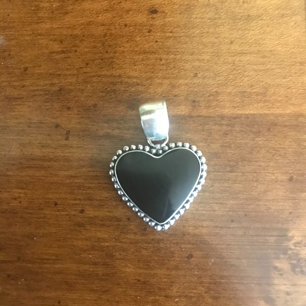 Handmade silver and black resin heart pendant